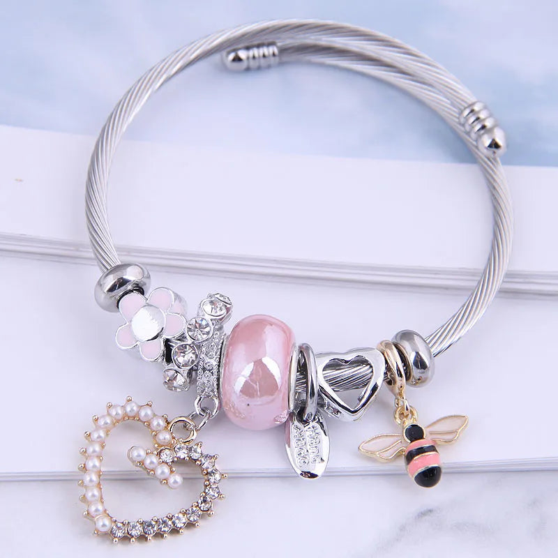Ατσάλινο βραχιόλι με charms από κράμα μετάλλων (B1636)