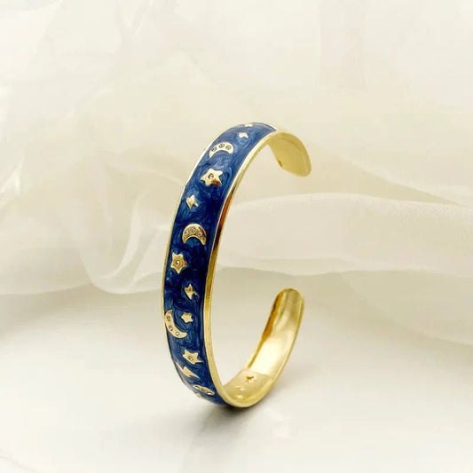 Βραχιόλι βέργα ατσάλινη με μπλε σμάλτο αστέρια και φεγγάρια (B1537) - charmy.gr