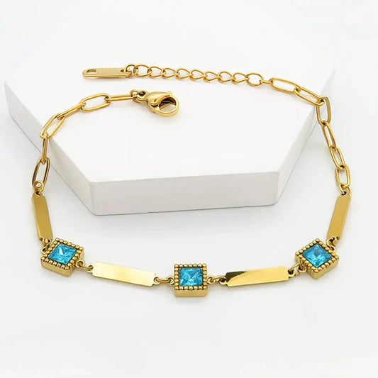 Επιχρυσωμένο Ατσάλινο Βραχιόλι με Τετράγωνες Τιρκουάζ Πέτρες (B3378) - charmy.gr