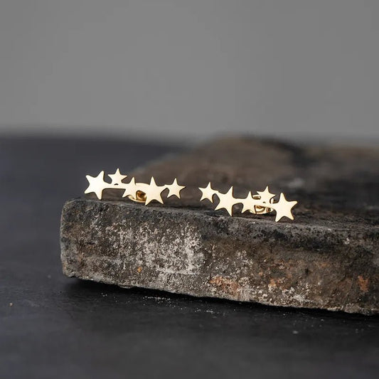 Ατσάλινα σκουλαρίκια καρφωτά αστέρια χρυσά (E1258) - earrings - charmy.gr