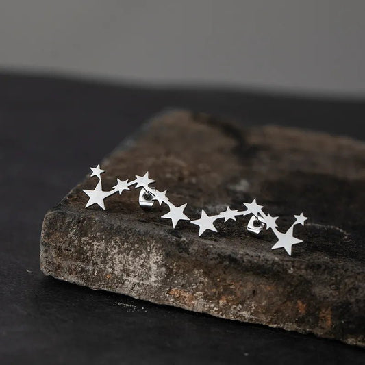 Ατσάλινα σκουλαρίκια καρφωτά σύμπλεγμα αστέρων χρώμα ασημί (E1265) - earrings - charmy.gr