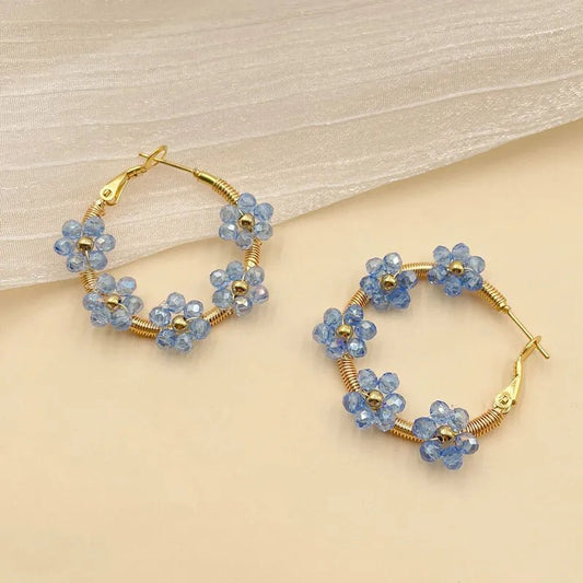 Γυναικεία ατσάλινα σκουλαρίκια κρίκοι επιχρυσωμένοι με λουλούδια (E1125)  - earrings - charmy.gr