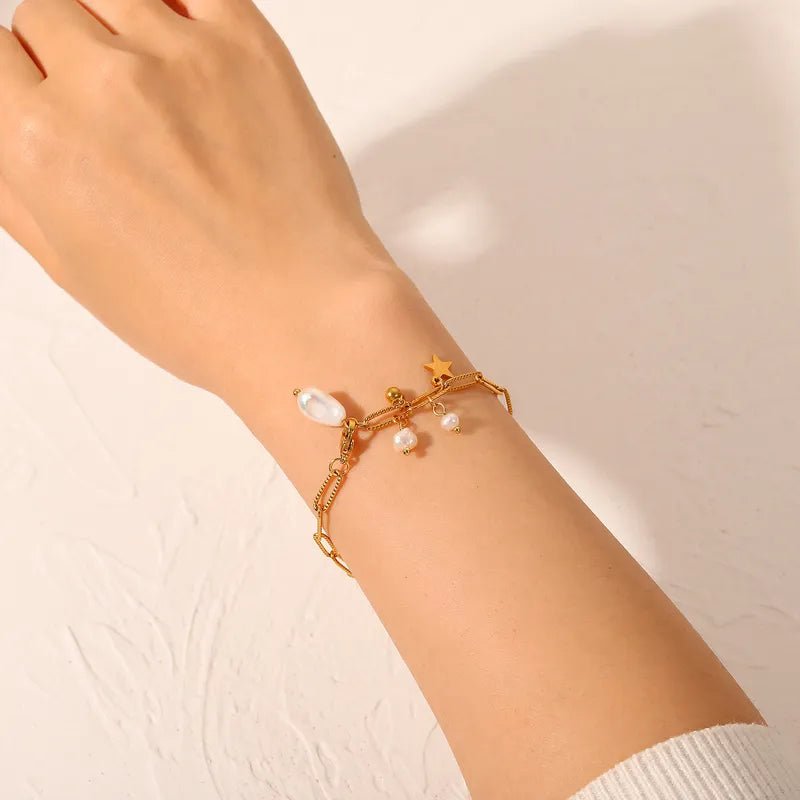 Γυναικεία ατσάλινη αλυσίδα χεριού επιχρυσωμένη 18k με πέρλα (B1264)  - bracelet - charmy.gr
