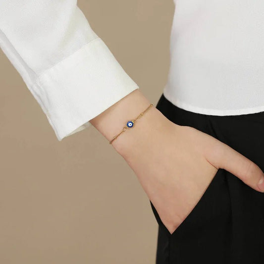 Γυναικείο ατσάλινο βραχιόλι επιχρυσωμένο με ματάκι (B1273)  - bracelet - charmy.gr