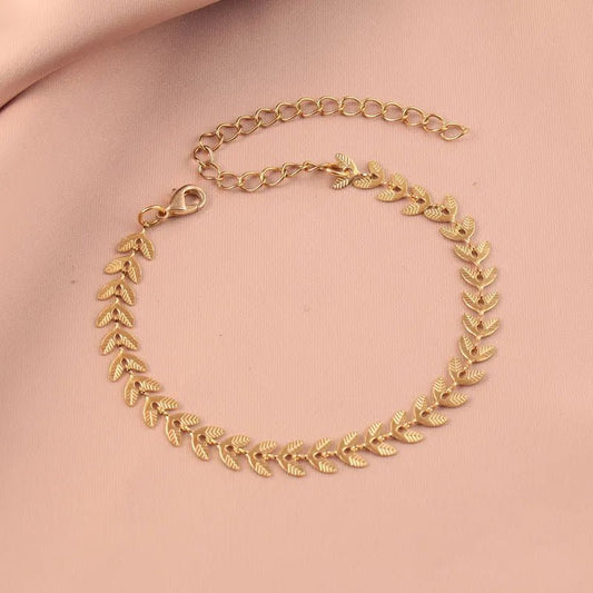 Γυναικείο ατσάλινο βραχιόλι με σχέδιο φύλλα χρώμα χρυσό (B1291) - bracelet - charmy.gr