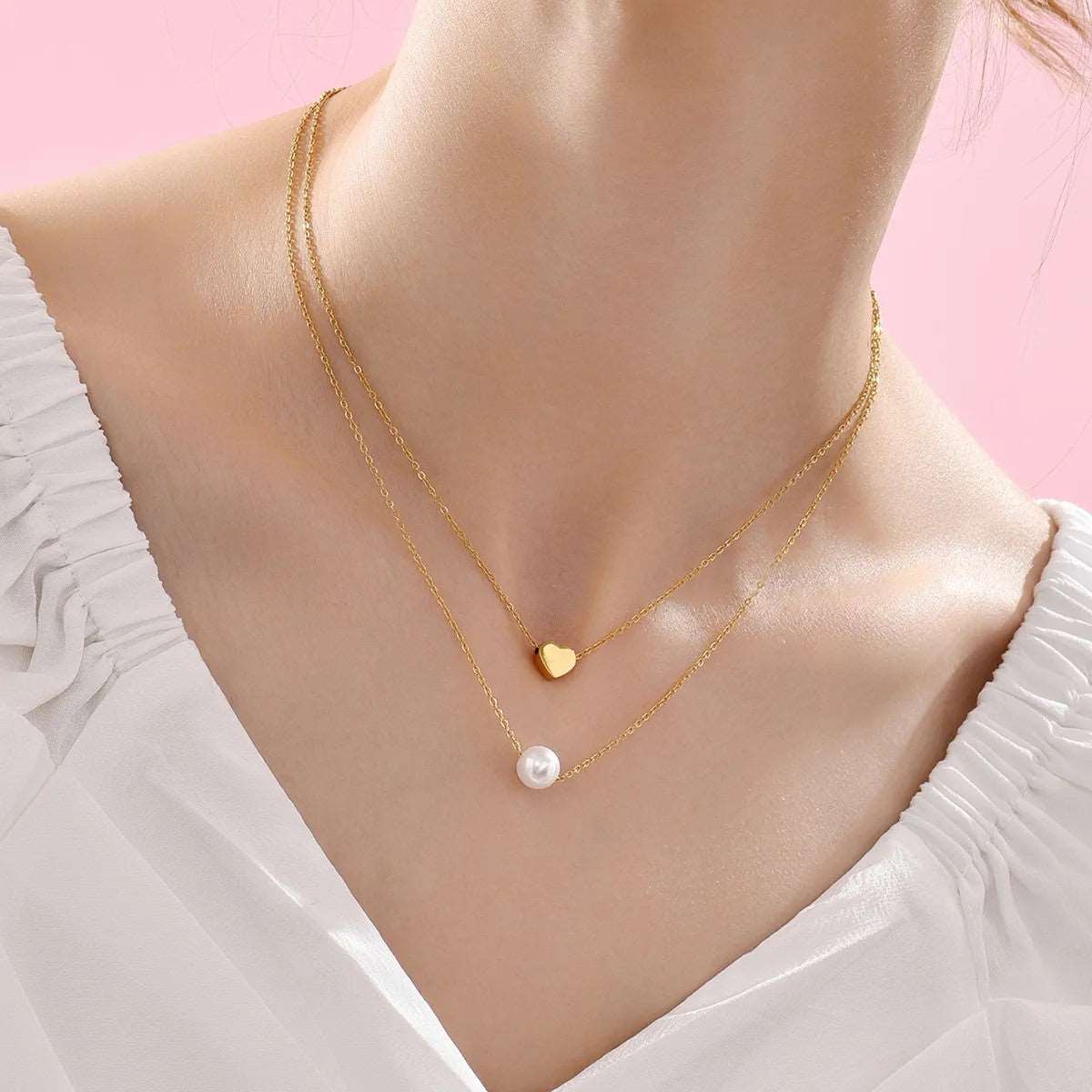Γυναικείο ατσάλινο κολιέ με διπλή αλυσίδα καρδιά και πέρλα επιχρυσωμένο (N1160) - necklace  - charmy.gr