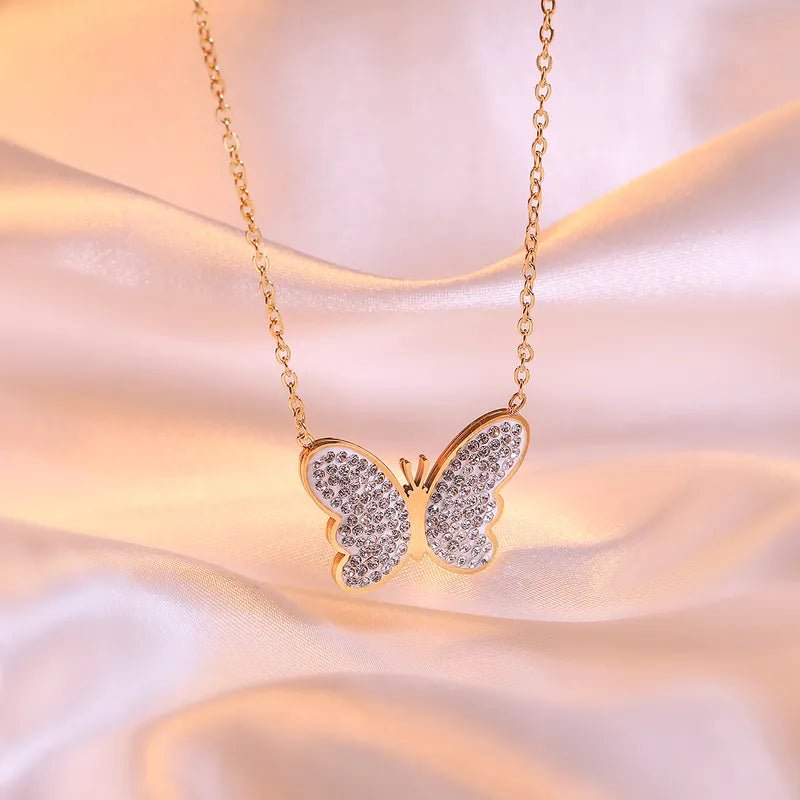 Ατσάλινο κολιέ πεταλούδα με ζιργκόν (N1558) – necklace – charmy.gr