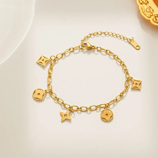 Γυναικείο βραχιόλι ατσάλινο με πολλαπλά στοιχεία χρώμα χρυσό (B1326) - bracelet - charmy.gr