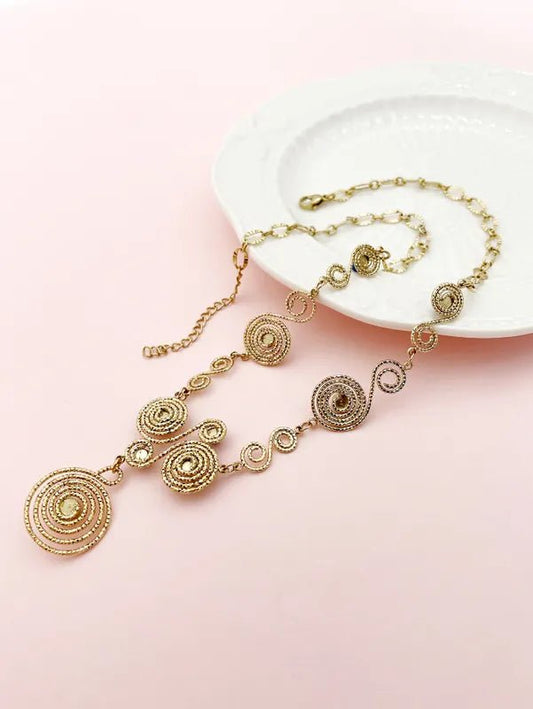 Κολιέ ατσάλινο με κυκλικά μοτίβα επιχρυσωμένο (N1471) - necklace - charmy.gr