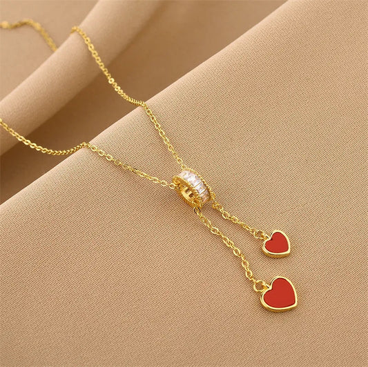 Γυναικείο κολιέ ατσάλινο με ροδέλα και δύο λευκές καρδιές επιχρυσωμένο (N1367) - necklace - charmy.gr