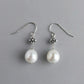 Ασημένια 925 Σκουλαρίκια Μάκρος 3cm με Οβάλ Μαργαριτάρια Γλυκού Νερού (PE022)