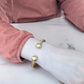 Επιχρυσωμένο Ατσάλινο Βραχιόλι "Cuff" με Στριφτή Υφή και Μπίλιες (Β3357)