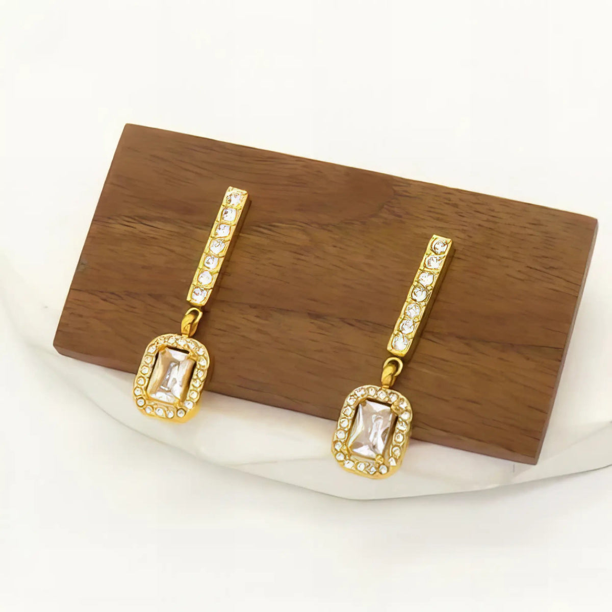 Ατσάλινα κρεμαστά σκουλαρίκια επιχρυσωμένα με ζιργκόν 3cm (Ε3206) - charmy.gr