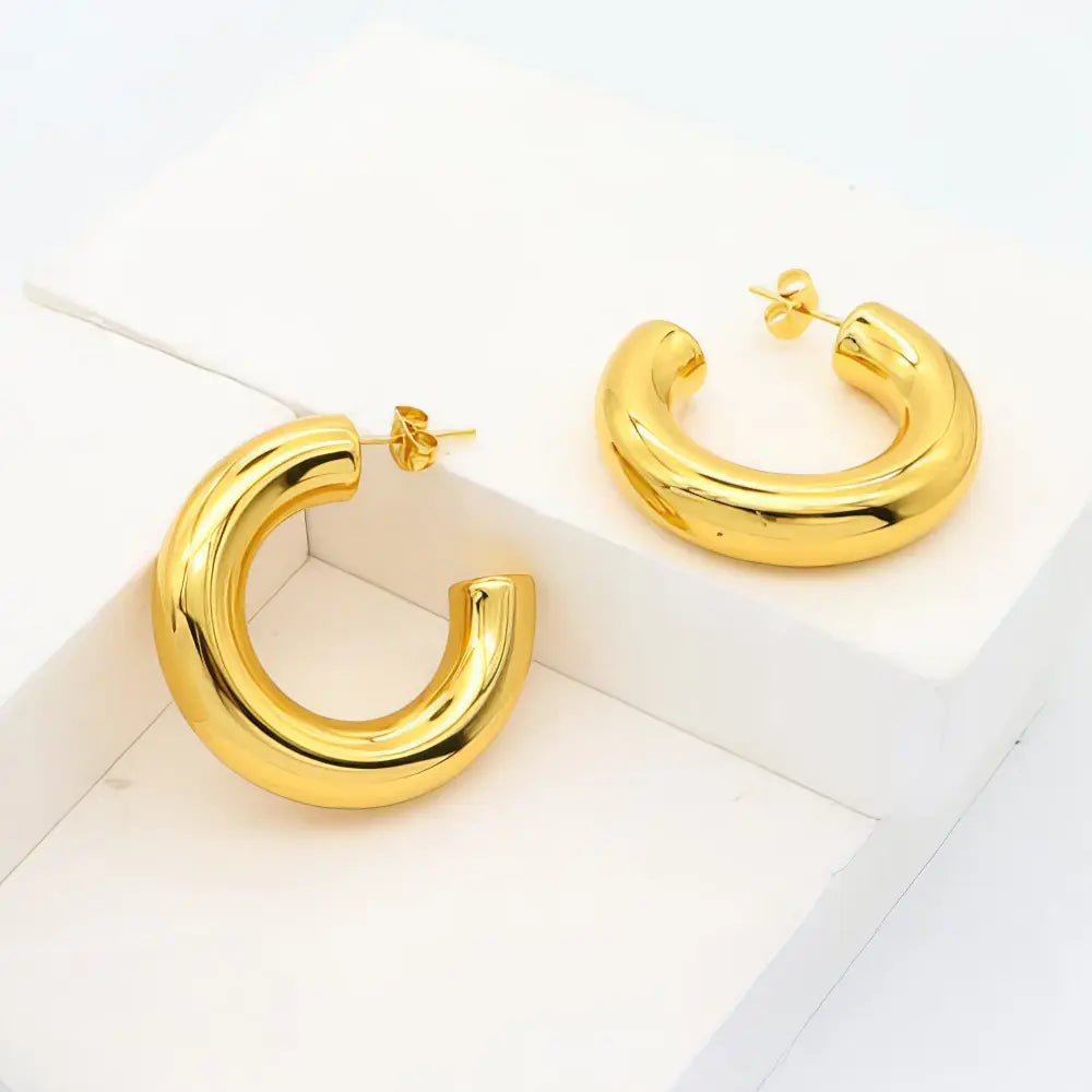 Ατσάλινα Σκουλαρίκια Hollow - Διάμετρος 35mm (Χρυσό) (E3129) - charmy.gr