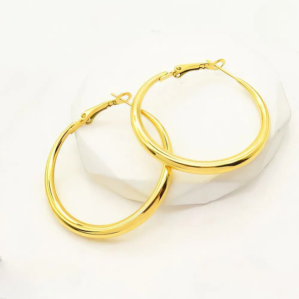 Ατσάλινα σκουλαρίκια κρίκοι επιχρυσωμένοι 4.1cm (E3102) - charmy.gr