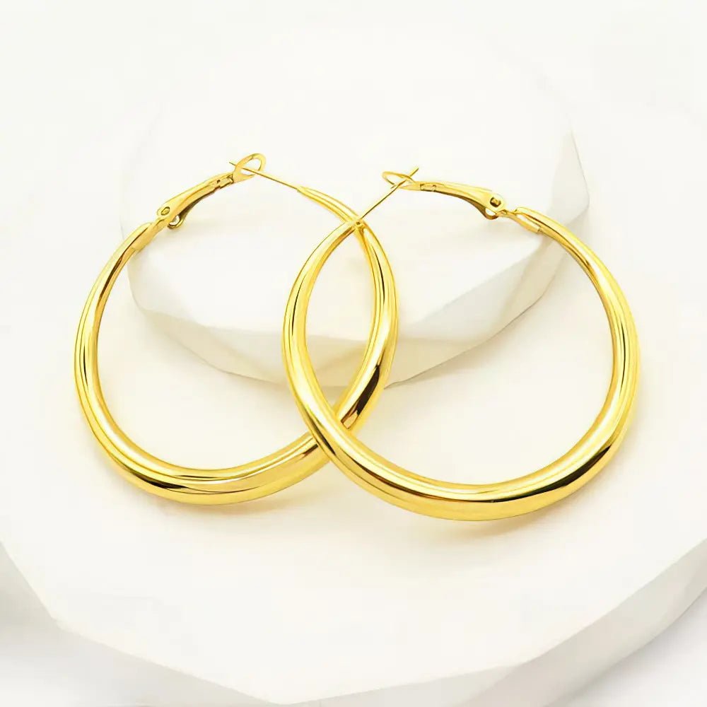 Ατσάλινα σκουλαρίκια κρίκοι επιχρυσωμένοι 4.7cm (E3101) - charmy.gr