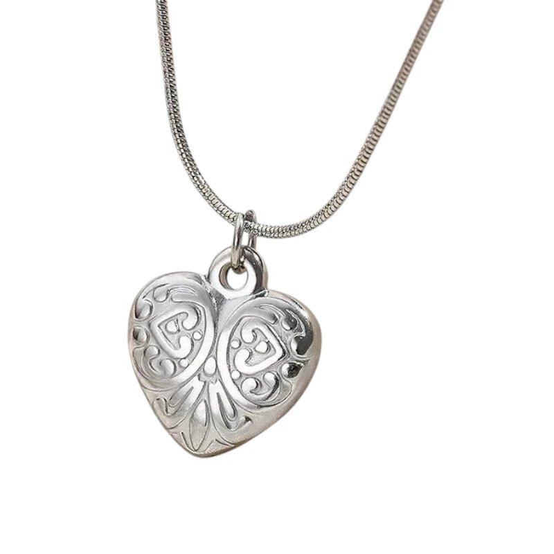 Ατσάλινο κολιέ καρδιά με μοτίβο λουλούδι χρώμα ασημί (N1584) - charmy.gr