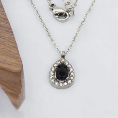 Ατσάλινο κολιέ ροζέτα ασημί με μαύρη πέτρα (N3155) - charmy.gr