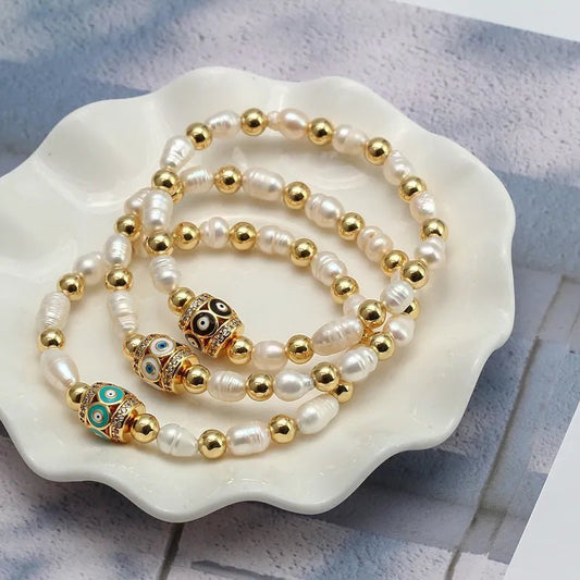 Γυναικείο βραχιόλι ατσάλινο με μεταλλικές χάντρες και πέρλες χρώμα χρυσό (B1499) - bracelet - charmy.gr
