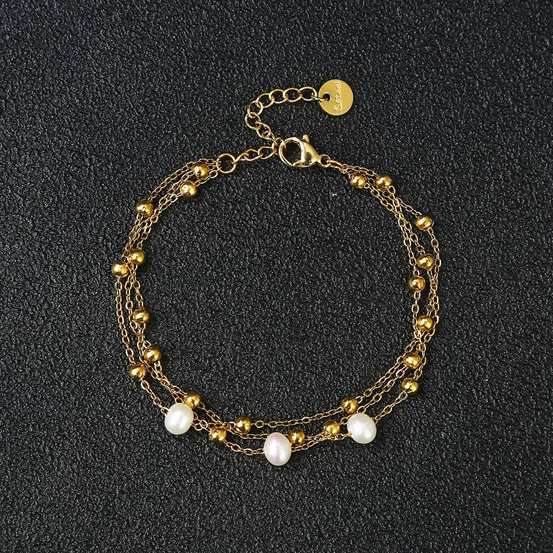 Γυναικείο βραχιόλι ατσάλινο με τριπλή αλυσίδα με καλλιεργημένα μαργαριτάρια επιχρυσωμένο (B1356) - bracelet - charmy.gr